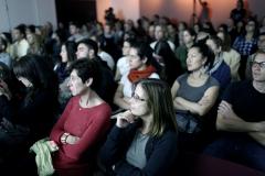 A group of people at an lecture.