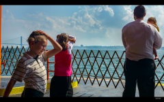 A family looking out to the sea.